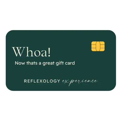 Reflexology gift card with gold chip and green background.