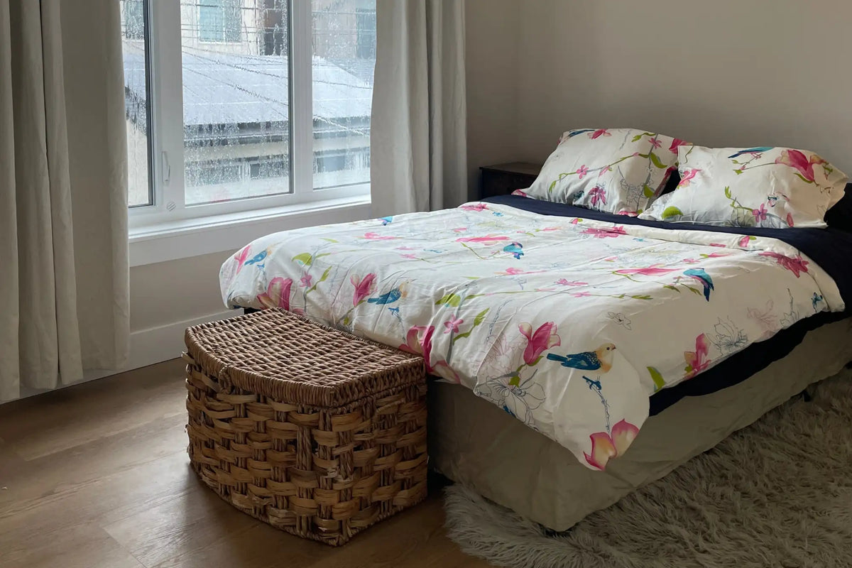 Woven wicker storage basket with a rectangular shape and slightly rounded corners